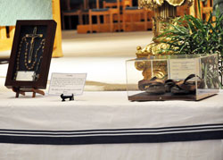 Blessed Teresa of Calcutta&rsquo;s rosary and the crucifix she wore at her waist as well as her well-worn sandals were displayed during the memorial Mass on July&nbsp;14 at SS. Peter and Paul Cathedral. (Photo by Mary Ann Wyand)