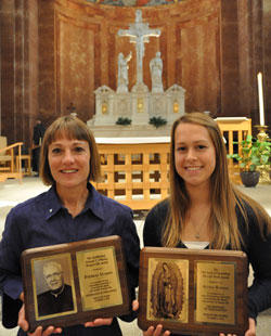 St. Joan of Arc parishioner Patricia Yeadon of Indianapolis, left, holds the 2010 Archbishop Edward T. O&rsquo;Meara Respect Life Award and Cardinal Ritter High School senior Alyssa&nbsp;Barnes, a member of St. Malachy Parish&nbsp;in Brownsburg, displays the 2010 Our Lady of Guadalupe Pro-Life Youth Award following the Respect Life Mass on Oct. 3 at SS. Peter and Paul Cathedral in Indianapolis. (Photo by Mary Ann Wyand)