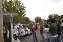 Jennings County Catholics gather in prayer on Oct. 2 outside of Good Shepherd Chapel at St. Mary (Nativity of the Virgin Mary) Parish in North Vernon as the parish&rsquo;s pastor, Father Jonathan Meyer, prepares to inaugurate perpetual adoration of the Blessed Sacrament in the chapel. Father Meyer is also the pastor of St. Ann Parish and St. Joseph Parish, both in Jennings County. (Submitted photo/Missy Scarlett)