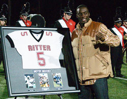 Indianapolis Colts running back and kick returner Devin Moore poses on Oct. 15 at St. Vincent Health Field at Marian University in Indianapolis during a Cardinal Ritter Jr./Sr. High School football game. The Indianapolis West Deanery interparochial high school retired his number that night. Moore graduated from Cardinal&nbsp;Ritter in 2004, and was a member of its 2003 state champion football team. (Submitted photo/Steve Rettig)