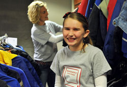Now 11, Makenzie Smith of St. Mary Parish in Navilleton has led a coat collecting drive to help people in need for the past five years. This year, Makenzie&rsquo;s Coat Closet collected more than 4,000 coats that were distributed to people from southern Indiana and northern Kentucky on Dec. 14, 2010. (Submitted photo/Kevin Smith)
