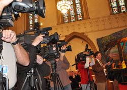 Videographers and reporters from Indianapolis television stations and newspapers participate in a Jan. 14 press conference at St. John the Evangelist Church in Indianapolis as Archbishop Daniel M.&nbsp;Buechlein introduces Bishop-designate Christopher J. Coyne. (Photo by Mary Ann Wyand)