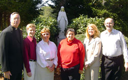 In this 2007 photo, then-Father Christopher J. Coyne, the pastor of St. Margaret Mary Parish in Westwood, Mass., left, poses with the faith community&rsquo;s pastoral staff. They include, from left, music director Patrick Valentino, secretary/parish coordinator Mary McSorely, pastoral associate Mary Peterson (no longer on the staff), director of religious education and youth ministry Karelene Duffy, and Deacon Joseph E.&nbsp;Holderried. (Submitted photo)