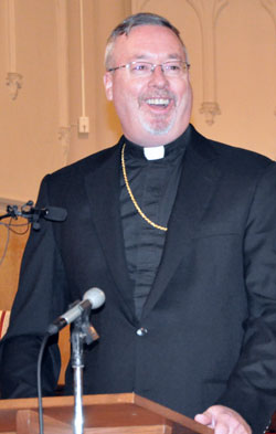 Bishop-designate Christopher J. Coyne smiles&nbsp;during a Jan. 14 press conference at St. John the Evangelist Church in Indianapolis. On that day, Pope Benedict XVI appointed Bishop-designate Coyne as an auxiliary bishop for the Archdiocese of Indianapolis. (Photo by Mary Ann Wyand)