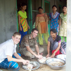 Bobby Powers, second&nbsp;from left, has made two trips to Bangladesh in recent summers to teach English to high school students and help with alternative energy efforts. He is a graduate of Immaculate Heart of Mary School and Cathedral High&nbsp;School, both in Indianapolis. (Submitted photo)