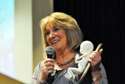 Ultrasound technician and pro-life speaker Shari Richard of West Bloomfield, Mich., displays a fetal model made by Our Lady of Mount Carmel parishioner Noel Merrick of Carmel, Ind., in the Lafayette Diocese, during her keynote speech for the Great Lakes Gabriel Project&rsquo;s second annual &ldquo;Partners for Life&rdquo; fundraising dinner on March 29 in Indianapolis. The pro-life ministry&rsquo;s website is www.glgabrielproject.org. (Photo by Mary Ann Wyand)