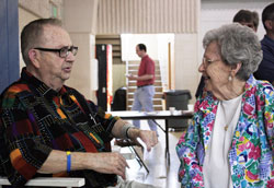 Jerry Craney talks with Helen&nbsp;Gasper during a June 5 retirement reception in which he was honored for his 52 years as the music minister at Most Holy Name of Jesus Parish in Beech Grove. (Photo by Alea Bolwing)