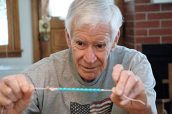 Bill Miller &lsquo;s love for a grandchild and his special connection to the Blessed Mother has led him to dedicate his free time to making rosaries as a member of Our Lady&rsquo;s Rosary Makers at Christ the King Parish in Indianapolis. (Photo by John Shaughnessy)