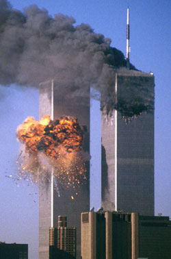 United Flight 175 crashes into the south tower of the World Trade Center in New York as the north&nbsp;tower burns after being hit by American Flight 11 in this file photo from Sept. 11, 2001. The attacks claimed the lives of 2,749 people in New York. (CNS photo/Sean Adair, Reuters)
