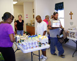 People in need receive food at Deli Days, a food pantry operated by Catholic Charities Terre Haute at its Bethany House Soup Kitchen in Terre Haute. Contributions to the &ldquo;Christ Our Hope: Compassion in Community&rdquo; annual appeal support Catholic Charities ministries across central and southern Indiana. (Submitted photo)