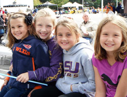 Members of the third-grade class at St. Luke the Evangelist School in Indianapolis are all smiles during the parish&rsquo;s Jubilee Jam Festival on Sept. 24 on the grounds of the Indianapolis North Deanery parish. The third-grade students are, from left, Elena Telesco, Caroline Kiefer, Julianne Vaughan and Claire Bromund. A special Mass to mark St. Luke&rsquo;s 50th anniversary was celebrated that evening. (Submitted photo)
