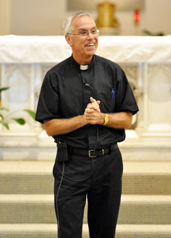 Father Todd Riebe speaks on Aug. 17, 2011, at St. Andrew Church in Richmond to archdiocesan seminarians who were on a pilgrimage to the three parishes in the eastern Indiana city. Father&nbsp;Riebe is the pastor of the Richmond Catholic Community made up of the parishes of Holy Family, St. Andrew and St. Mary. (File photo by Sean Gallagher)