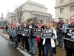 Youths from the Archdiocese of Indianapolis show their smiles and their support of life in the moments before they participate in the annual March for Life in Washington on Jan.&nbsp;23. (Submitted photo)