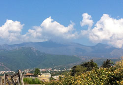 Smoke rises from craters in Mount Etna, Sicily&rsquo;s active volcano, which last erupted in 2006. (Submitted photo by Regina Fink)
