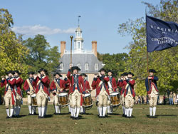 Costumed interpreters dressed in Revolutionary War uniforms play fifes and drums during a historical re-enactment program in Colonial Williamsburg, where guests experience the challenges of creating a new, self-governing society. (Photos courtesy Colonial Williamsburg Foundation&copy;)
