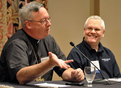 Bishop Christopher J. Coyne, apostolic administrator of the archdiocese, speaks during a panel discussion on blogging on June 22 at the Catholic Media Conference in Indianapolis. Also on the panel was Deacon Greg Kandra, executive editor of One, the magazine of the Catholic Near East Welfare Association, who also maintains his own blog, &ldquo;The Deacon&rsquo;s Bench.&rdquo; (Photo by Sean Gallagher)