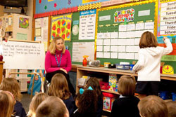 Jacque Singleton teaches a class of first-grade students on Dec. 8, 2010, at St. Anthony School in Clarksville. The &ldquo;United Catholic Appeal: Christ Our Hope&rdquo; helps support the ministry of the archdiocese&rsquo;s Office of Catholic Education, which helps Catholic schools across central and southern Indiana provide a high quality education to their students. (Submitted photo)