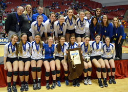 Members of the Bishop Chatard High School Class 3A state championship girls&rsquo; volleyball team pose with their trophy on Nov. 3. (Submitted photo)