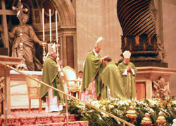 Cardinal Tarcisio Bertone, center, Vatican secretary of state, ritually lays hands on the head of then-Redemptorist Father Joseph Tobin during an Oct. 9, 2010, Mass in which Father Tobin was ordained an archbishop at St. Peter&rsquo;s Basilica at the Vatican. Archbishop Tobin received his priestly formation at Mount St. Alphonsus, the former Redemptorist seminary and later retreat center in Esopus, N.Y., which was closed earlier this year by the congregation. (Submitted photo)