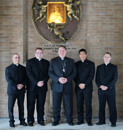 Archbishop Joseph W. Tobin, center, poses on Oct. 31 at the Pontifical North American College in Rome with archdiocesan seminarians who receive their priestly formation there. They are, from left, seminarian Matthew Tucci, a member of Holy Family Parish in New Albany; transitional Deacon Douglas Marcotte, a member of St. Michael Parish in Greenfield; transitional Deacon Martin Rodriguez, a member of St.&nbsp;Mary Parish in Indianapolis; and seminarian Anthony Hollowell, a member of Nativity of Our Lord Jesus Christ Parish in Indianapolis. (Submitted photo)