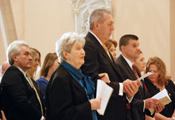 Marie Tobin holds her son Jim&rsquo;s arm during the installation Mass for her oldest son, Archbishop Joseph W. Tobin, on Dec. 3 at SS. Peter and Paul Cathedral in Indianapolis. (Photo by Father Shaun Whittington)