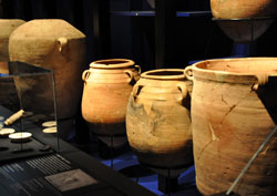 These pottery jars contained ancient religious documents for more than 2,000 years before they were discovered in 11 remote caves near Khirbet Qumran on the desolate northern shores of the Dead Sea in Israel. They were found by Bedoin goat herders and archaeologists between 1947 and 1956. Archdiocesan pilgrims traveled to the Cincinnati Museum Center on Dec. 12 to view fragments of the Dead Sea Scrolls displayed in a &ldquo;once-in-a-lifetime&rdquo; traveling exhibit on loan from the Israel Antiquities Authority. (Photo by Mary Ann Garber)