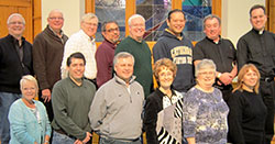 The Central Indiana Cursillo Community secretariat for the Archdiocese of Indianapolis and the Diocese of Lafayette pose for a picture at St. Monica Parish in Indianapolis on Feb. 2. Front row: Sandy Neidigh, left, Carlos Alatorre, Tom Kitchin, Beth Doran, Kathy Schallert and Molly Sanders. Back row: John Ameis, left, Tim Hays, Mark Scheller, Mark Totleben, Marty Van der Burgt, Tony Avellana, Father Glenn O&rsquo;Connor, who serves as Cursillo spiritual director in the Archdiocese of Indianapolis, and Father Mike McKinney, Cursillo spiritual director in the Diocese of Lafayette. (Submitted photo)