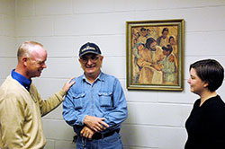 Clem Maga, center, shares a laugh with Bill Bickel and Christina Davis during a break in work at Holy Family Shelter in Indianapolis. After living for a month at the shelter in 1988 with his wife and six children, Maga has spent the past 25 years working at the shelter. Bickel is the shelter&rsquo;s director, and Davis is the shelter&rsquo;s director of operations. (Photo by John Shaughnessy)