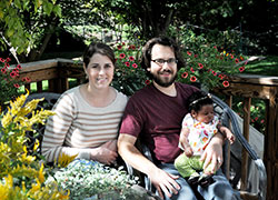 Melanie and Pete Kuester enjoy spending time with Margaret &ldquo;Maggie&rdquo; Katherine, the newborn baby girl they adopted in August, pictured here at 10 weeks. After a miscarriage and ongoing infertility issues, the couple adopted Maggie through St. Elizabeth/Coleman Pregnancy and Adoption Services in Indianapolis. (Photo by Natalie Hoefer)