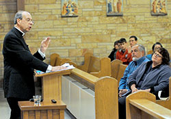 Archbishop William E. Lori of Baltimore gives a presentation on Nov. 29 at Our Lady of Perpetual Help Church in New Albany on the relationship of religious liberty and the Church&rsquo;s ministry of charity. Archbishop Lori grew up in the New Albany Deanery faith community. (Photo by Sean Gallagher)