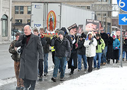 In this file photo, people stand in line to go to confession at Our Lady of the Most Holy Rosary Church in Indianapolis. From 6:30 p.m. to 8 pm. on April 2, priests will be available in churches across central and southern Indiana to celebrate the sacrament of penance with anyone who wishes to celebrate the sacrament and receive God&rsquo;s mercy and forgiveness. (File photo by Sean Gallagher)