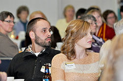 Christine Lopez, coordinator of the Gabriel Project at SS. Francis and Clare Parish in Greenwood, and her husband, Ryan, listen as Marianne Anderson shares her experiences working for the state&rsquo;s largest abortion provider during a Great Lakes Gabriel Project dinner on Feb. 6 in Indianapolis. (Photo by Natalie Hoefer)