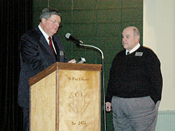 Bob Teipen, left, recognizes Jim Ganley for his 10 years of service to Catholic Radio Indy during its anniversary dinner on Feb. 25 at the northside Knights of Columbus Hall. Teipen is the founder and chairman of Inter Mirifica, Inc., which owns and operates Catholic Radio Indy. Ganley is the radio station&rsquo;s general manager and president of its board of directors. (Photo by Mike Krokos)