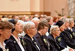Daughters of Charity sisters of the St. Louise Province in St. Louis, Mo., to which the sisters in Indiana belong, listen to Archbishop Joseph W. Tobin&rsquo;s homily at the farewell Mass in SS. Peter and Paul Cathedral in Indianapolis on April 28. The Daughters of Charity, which have operated the St. Vincent Health network of hospitals in Indiana for 133 years, are leaving the Archdiocese of Indianapolis and the Diocese of Lafayette. (Photo by Natalie Hoefer)