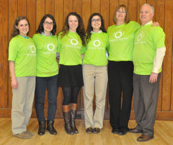 Colleen and Mark Lahr, at right, pose in February at the Archbishop Edward T. O&rsquo;Meara Catholic Center in Indianapolis with four young women who were awarded scholarships to go on foreign mission trips. The awardees are, from left, Rebecca Doyle, Mary Carper, Shannon Jager and Nicolette Peters. They received the scholarships from the Brooke Nicole Lahr Memorial Fund for International Mission Work. It is named after Mark and Colleen&rsquo;s daughter, who died in Mexico in 2013 while doing mission work. (Photo by Sean Gallagher)