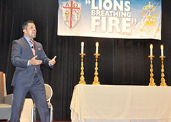 Hector Molina enthusiastically addresses participants on Sept. 20 during the Indiana Catholic Men&rsquo;s Conference at the Indianapolis Marriott Downtown. (Photo by Sean Gallagher)
