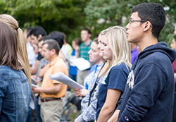 Young adults gather for Mass at the archbishop&rsquo;s residence as part of the archdiocesan Young Adult and College Campus Ministry&rsquo;s &ldquo;Bishop&rsquo;s Bash&rdquo; event on Sept. 15, 2013. The event is a way for the archdiocese to reach out to young adult Catholics to stem the tide of 75-80 percent of college students falling away from the faith. The ministry is supported by funds from the annual United Catholic Appeal. (Submitted photo)