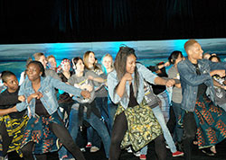 Members of the Global Children, African Dancers group from the archdiocese&rsquo;s African Catholic Ministry lead other Catholic youths in a joyous beginning to the Indianapolis Catholic Youth Conference on Nov. 2 at Marian University in Indianapolis. (Photo by John Shaughnessy)