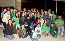 Band members of Father Michael Shawe Memorial Jr./Sr. High School in Madison pose on Oct. 17 with Father Hilary Meny outside SS. Peter and Paul Church in Haubstadt, Ind., in the Evansville Diocese. Father Meny has been a longtime supporter of Shawe&rsquo;s band, which also became a marching band for the first time this school year. (Submitted photo)