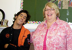 Grant Bishop and Christina Flum share a moment of joy together during a recent session of &ldquo;Faith, Fun and Friends&rdquo;&mdash;a weekly program at the Aquinas Center in Sellersburg, a resource center for the New Albany Deanery. Flum leads the program that is designed to enhance the Catholic faith of people with special needs in the deanery. (Submitted photo)