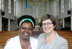When Cynthia Kanko, left, needed a friend to help her through the challenges of a cancer diagnosis, she unexpectedly found one in a stranger, Georgia Frey. They are pictured inside St. Paul Catholic Center in Bloomington, their home parish. (Photo by John Shaughnessy)