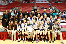 Cathedral High School players and coaches are pictured with the Class 4A state volleyball trophy on Nov. 7 at Ball State University&rsquo;s Worthen Arena in Muncie. (Submitted photo)
