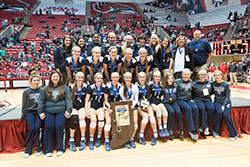 Our Lady of Providence Jr./Sr. High School players and coaches are pictured with the Class 3A state volleyball trophy on Nov. 7 at Ball State University&rsquo;s Worthen Arena in Muncie. (Submitted photo)