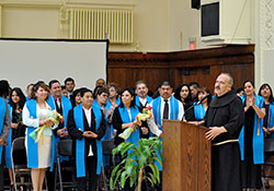 The first graduation class of the Hispanic Pastoral Leadership Institute listens as Franciscan Brother Moises Gutierrez speaks during a graduation reception at the Archbishop Edward T. O&rsquo;Meara Catholic Center in Indianapolis on May 11, 2013. (File photo by Natalie Hoefer)