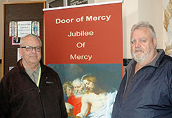 As part of their journey to re-establishing the special bond they had in their childhood, Norb Schott, left, and Ted Schott made a visit to SS. Peter and Paul Cathedral in Indianapolis, where the brothers walked together through the cathedral&rsquo;s &ldquo;door of mercy.&rdquo; (Photo by John Shaughnessy)