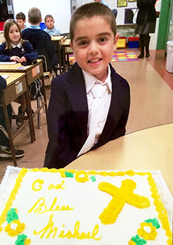 For most of his nine years, Michael Deiter has faced the continuing prognosis that he &ldquo;could die at any time.&rdquo; Here, the third-grade student at Our Lady of Lourdes School in Indianapolis is all smiles shortly after he celebrated a major moment in his spiritual life&mdash;receiving his first Communion. (Submitted photo)