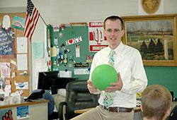 Doug Bauman adds real-life applications to the math classes he teaches at St. Barnabas School in Indianapolis, and he multiplies his influence on his students by sharing his faith and emphasizing service&mdash;qualities that led him to be selected as this year&rsquo;s recipient of the Saint Theodora Gu&eacute;rin Excellence in Education Award, the highest honor for a Catholic educator in the archdiocese. (Photo by John Shaughnessy)