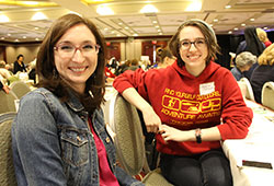 Jennifer Conley, left, and her sister, Jessica DeFrench, enjoy time together during the Indiana Catholic Women&rsquo;s Conference on March 19. Conley sees a miraculous connection between a healing service at last year&rsquo;s conference and the recent birth of her daughter, Mariella Faustina. The baby&rsquo;s first name, an Italian variation of Mary, also means &ldquo;wished-for child,&rdquo; while her middle name is in honor of St. Faustina Kowalska, who introduced the world to the Divine Mercy image and devotion. (Photo by Victoria Arthur)