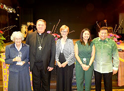 Three individuals were honored for their outstanding service to the archdiocese&rsquo;s mission of intercultural ministry on April 23 in Indianapolis. Pictured are honoree Franciscan Sister Norma Rocklage, left, Archbishop Joseph W. Tobin, keynote speaker Annette &ldquo;Mickey&rdquo; Lentz, and honorees Guadalupe Pimentel Solano and Marlon Alfonso. (Photo by Mike Krokos)