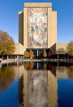 The University of Notre Dame is known for its Hesburgh Library&rsquo;s &ldquo;Word of Life&rdquo; mural&mdash;more commonly known as &ldquo;Touchdown Jesus.&rdquo; Pilgrims on the archdiocesan pilgrimage to the university on July 19 will visit Hesburgh Library and its famous mosaic mural. (Photos by Matt Cashore /University of Notre Dame)
